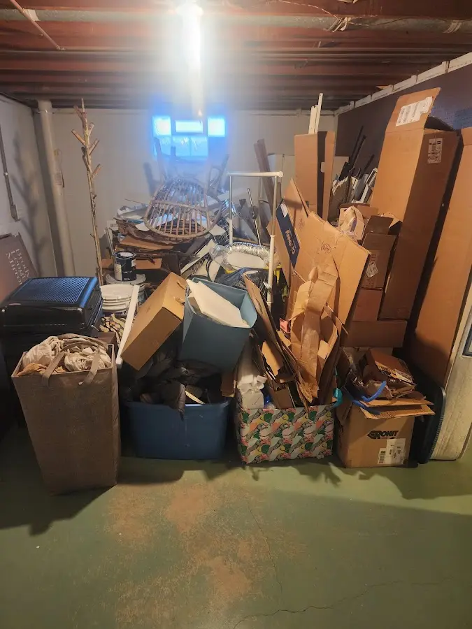 Roll-off dumpster container at job site for 2 Yard Dumpster Rental in Victor